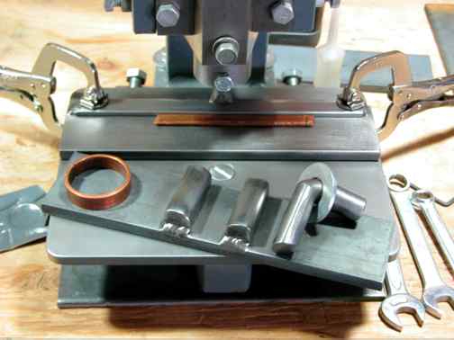 Image of P-0 press with some tooling.